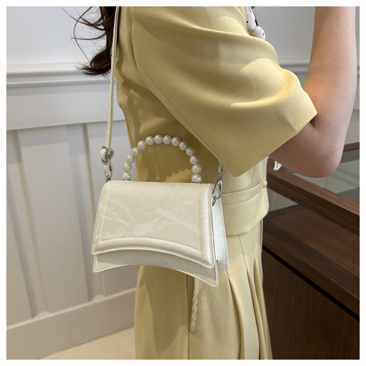 Trendy and Sophisticated Niche Handbags for Women, Popular in 2025 Summer, New Pearl Design Small Tote and Crossbody Bag