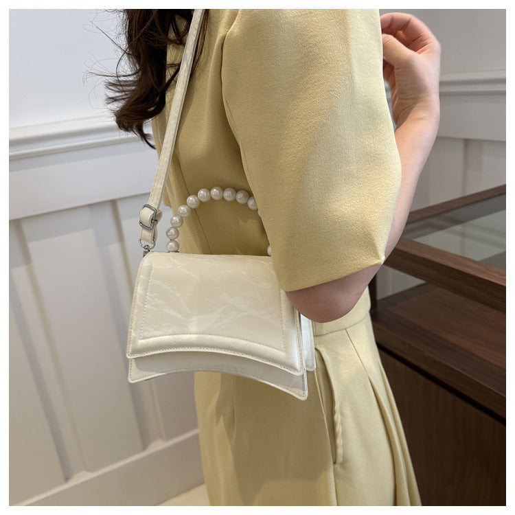 Trendy and Sophisticated Niche Handbags for Women, Popular in 2025 Summer, New Pearl Design Small Tote and Crossbody Bag